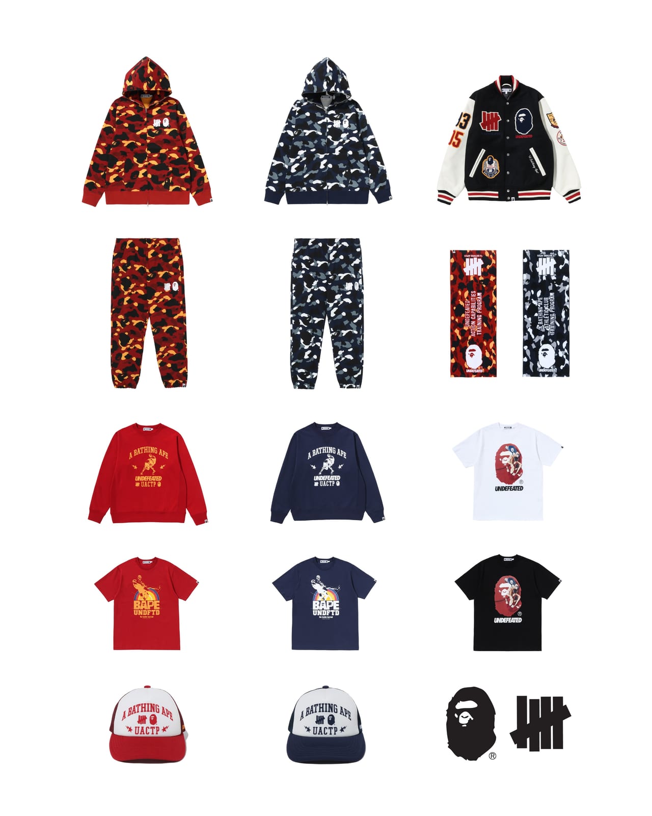 The BAPE x UNDEFEATED FW26 collection laid out on white: red and navy camo zip hoodies and sweatpants, the black varsity jacket, red and navy towels, red and navy crewnecks, white, red, navy and black tees, and red and navy trucker caps reading A Bathing Ape, with the ape head and 5-Strike logos