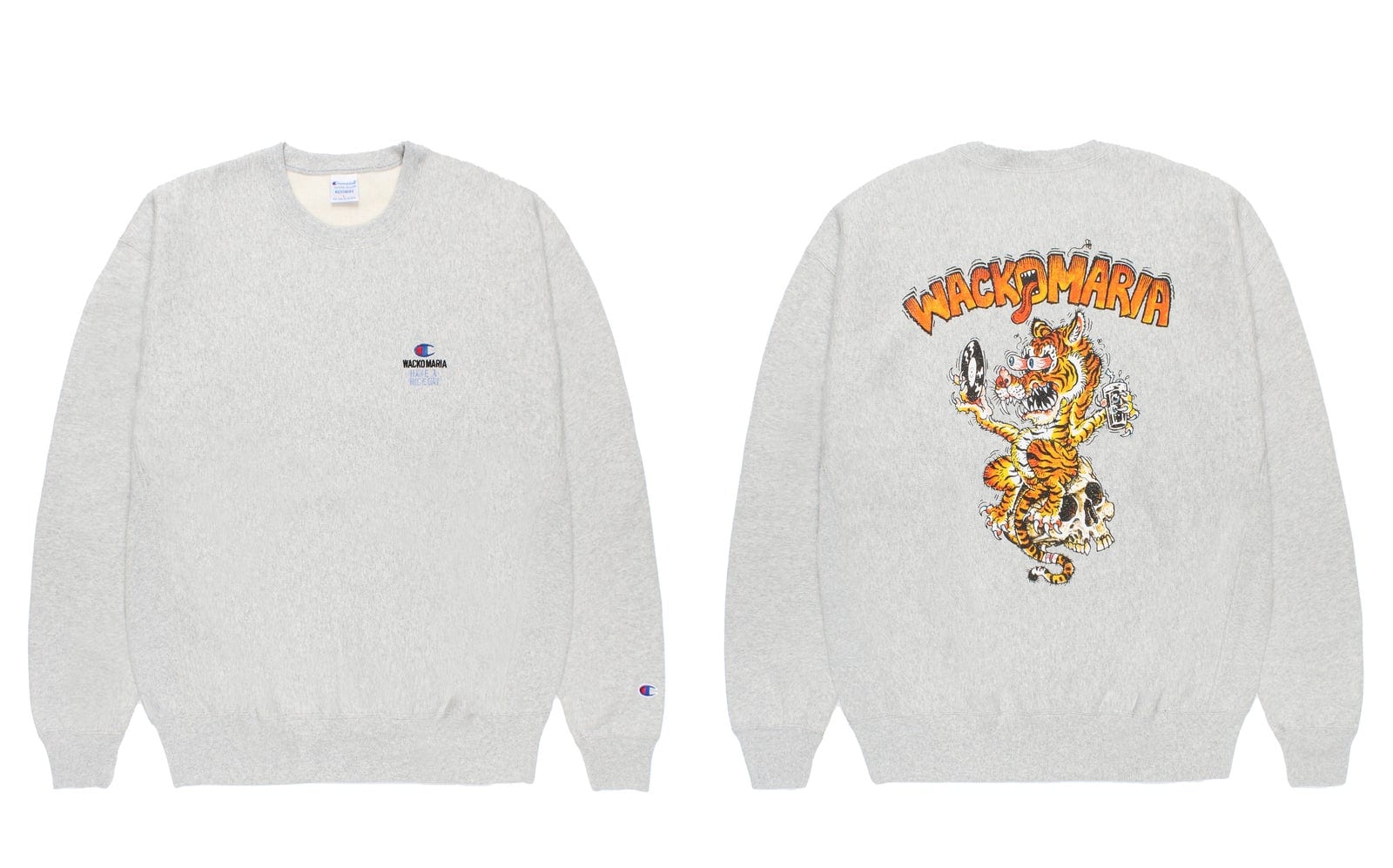 A grey Champion x WACKO MARIA crewneck shown front and back: a small embroidered logo on the chest, and on the back a tiger perched on a skull, holding a record, under an orange WACKO MARIA logo