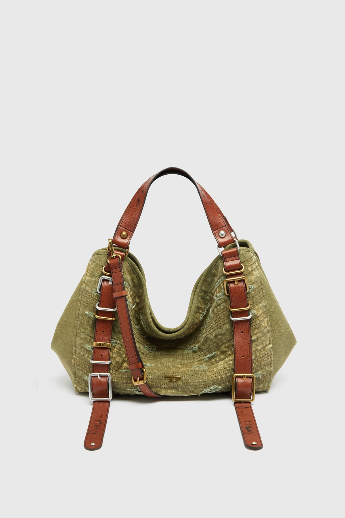 The Diesel D-One Medium top-handle bag in military green distressed canvas with ripped, heavily stitched front panels, brown leather straps and gold and silver buckles