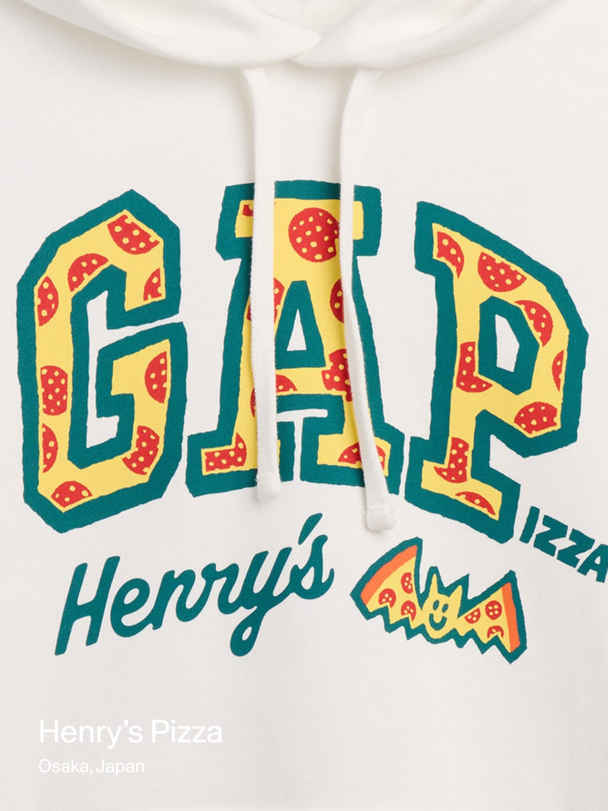 Close-up of a white hoodie with GAP drawn as yellow pizza letters with red pepperoni and green outlines, Henry's in green script and a small pizza slice beneath