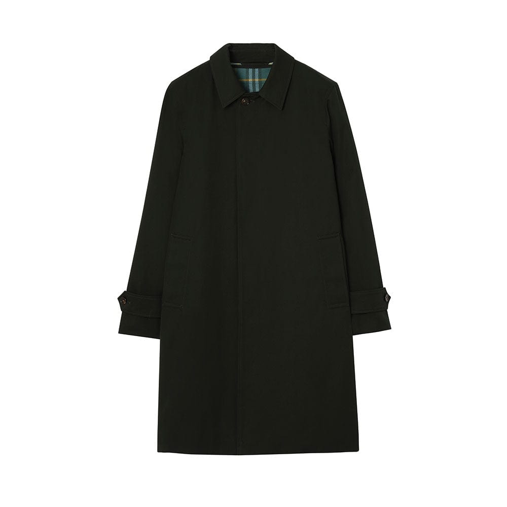 The Highgrove x Burberry Tottenham Car Coat in dark marsh green gabardine, single-breasted with a concealed closure, buttoned cuff tabs and a green check lining showing at the collar