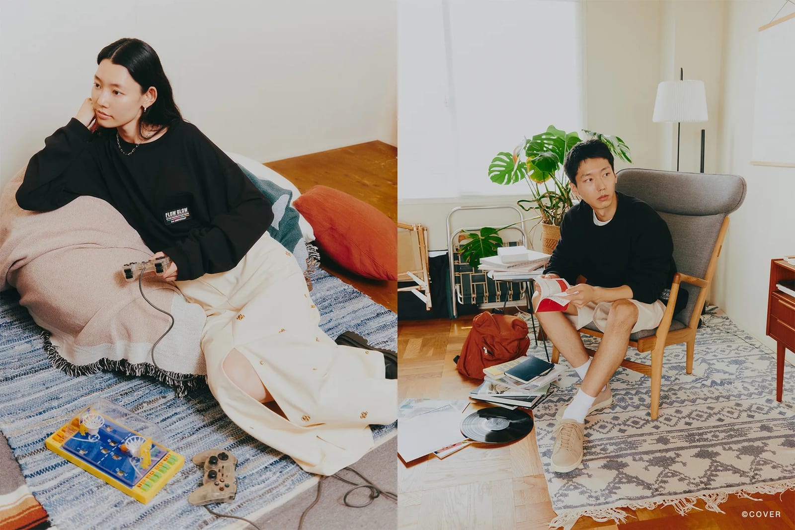 Two photos side by side: a woman in a black long-sleeve top with a FLOW GLOW patch on the chest and a long cream skirt, reclining against a cushion on a rug with a game controller, and a man in a black sweatshirt and cream shorts reading in a grey upholstered armchair beside a houseplant, a vinyl record on the floor