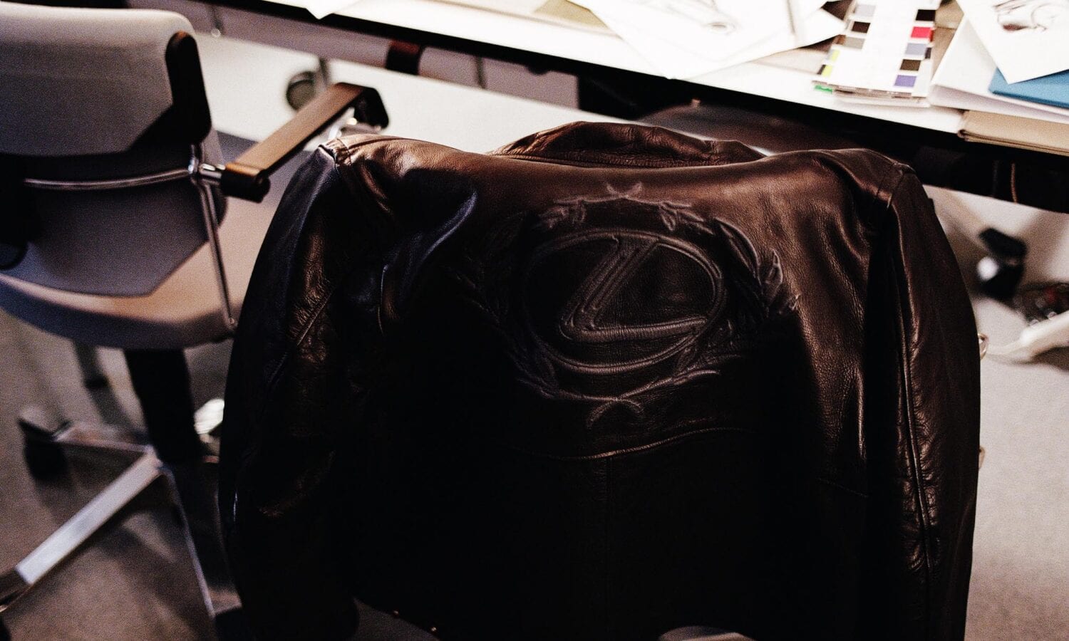 Close-up of the Future Classic Club leather fireman jacket, with an embossed Lexus L emblem on the back